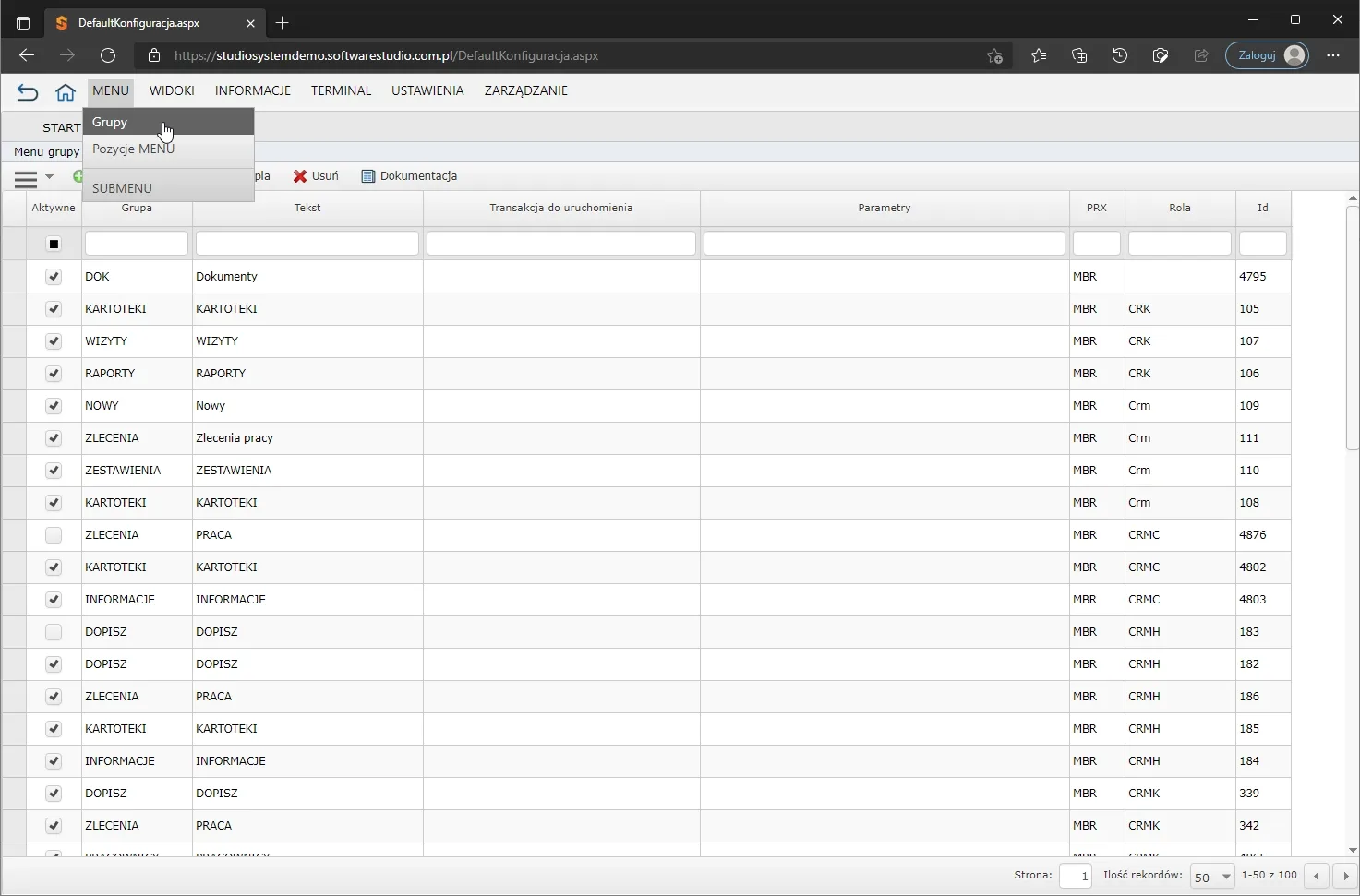 Rozwinięte menu MENU w StudioSystem z pozycjami Grupy, Pozycje MENU i SUBMENU nad tabelą danych